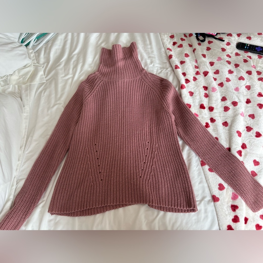Pink knit turtleneck